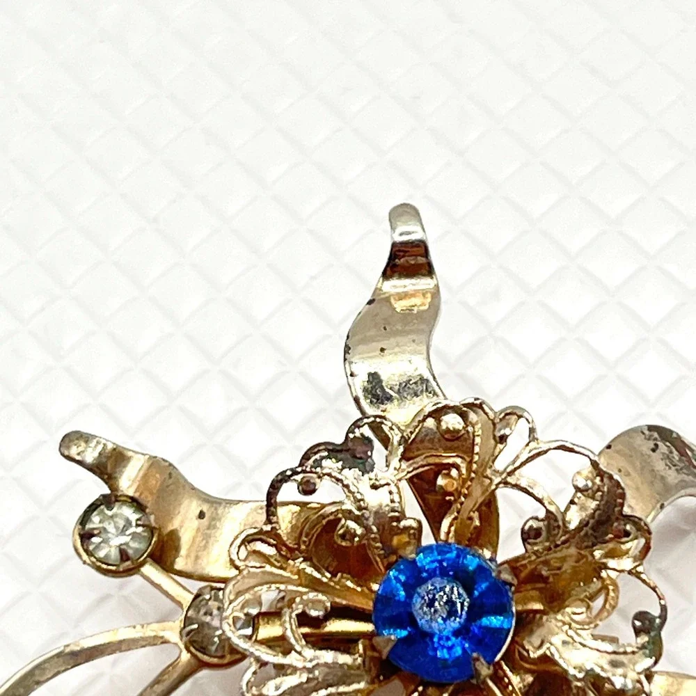 Vintage Gold Tone Flower Brooch w/ Blue and Clear Rhinestones